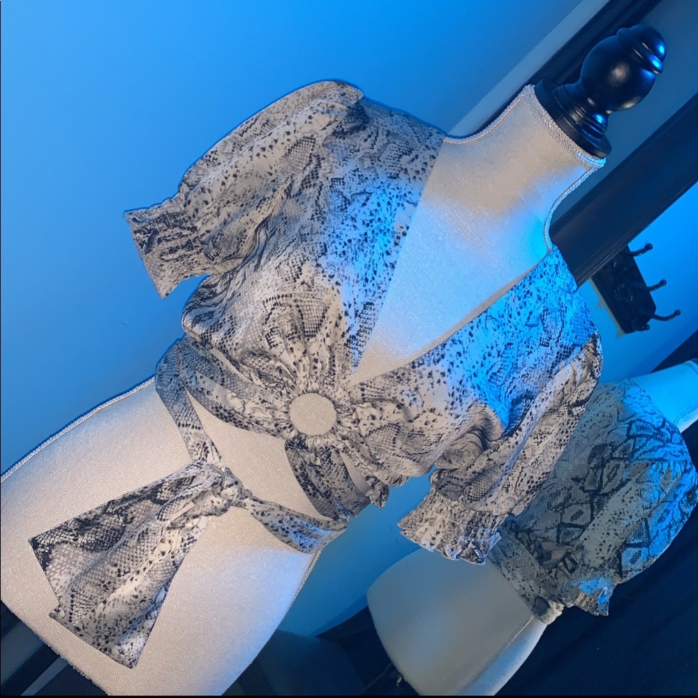 White abs black snakeskin cropped wrap top